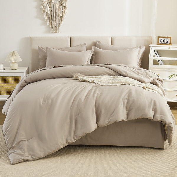 Litanika solid down alternative 7-piece bedding comforter set with matching pillow shams and sheets on a bed.