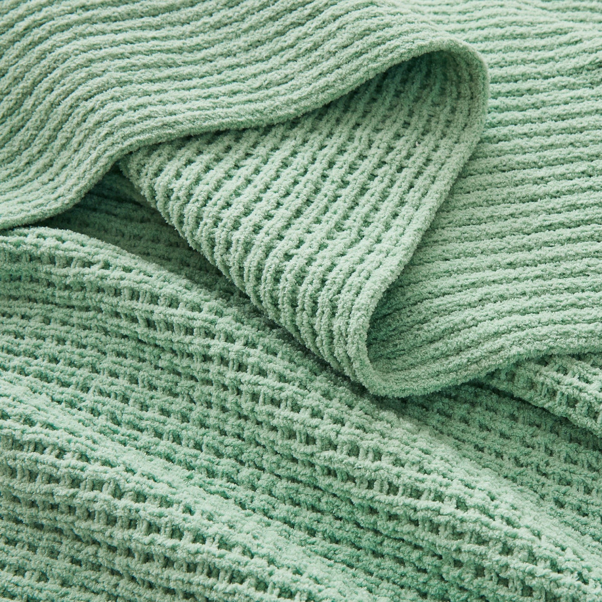 Litanika chenille knit waffle throw blanket in soft, textured bedding with a cozy, woven pattern, perfect for home decor.