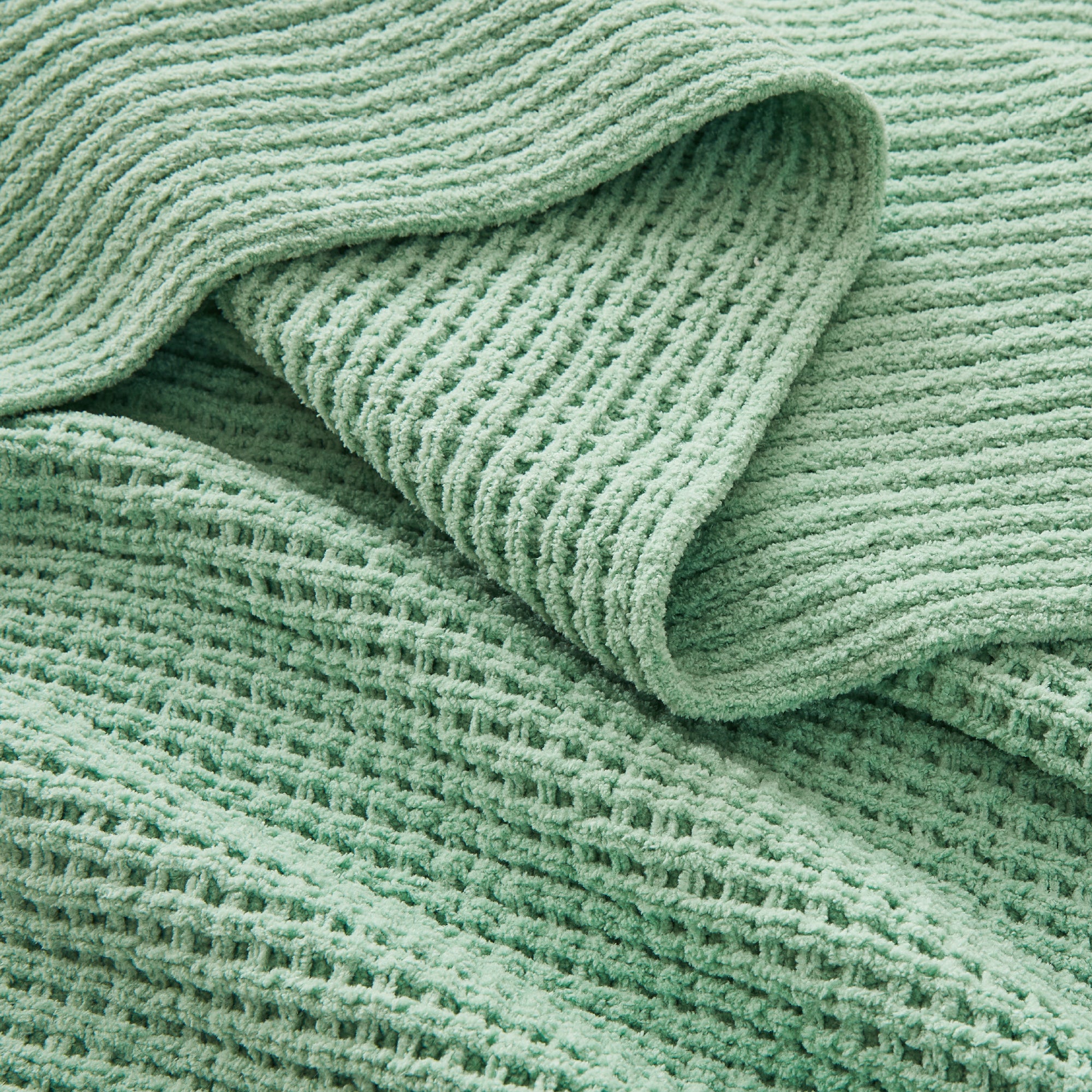 Litanika chenille knit waffle throw blanket in soft, textured bedding with a cozy, woven pattern, perfect for home decor.