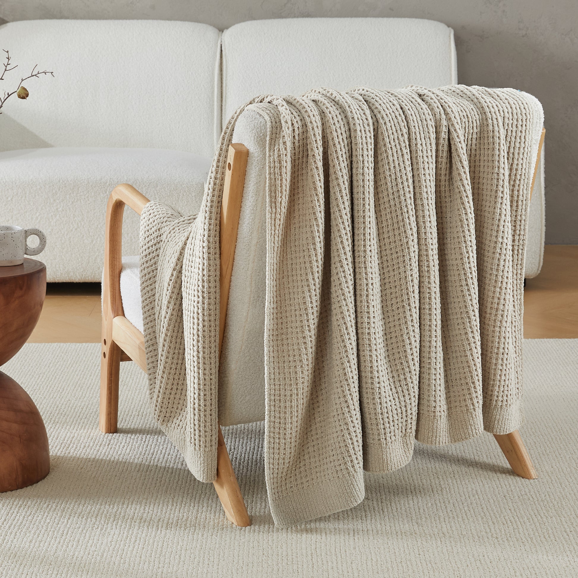 Litanika chenille knit waffle throw blanket in neutral beige, showcasing textured bedding with a soft, cozy appearance.