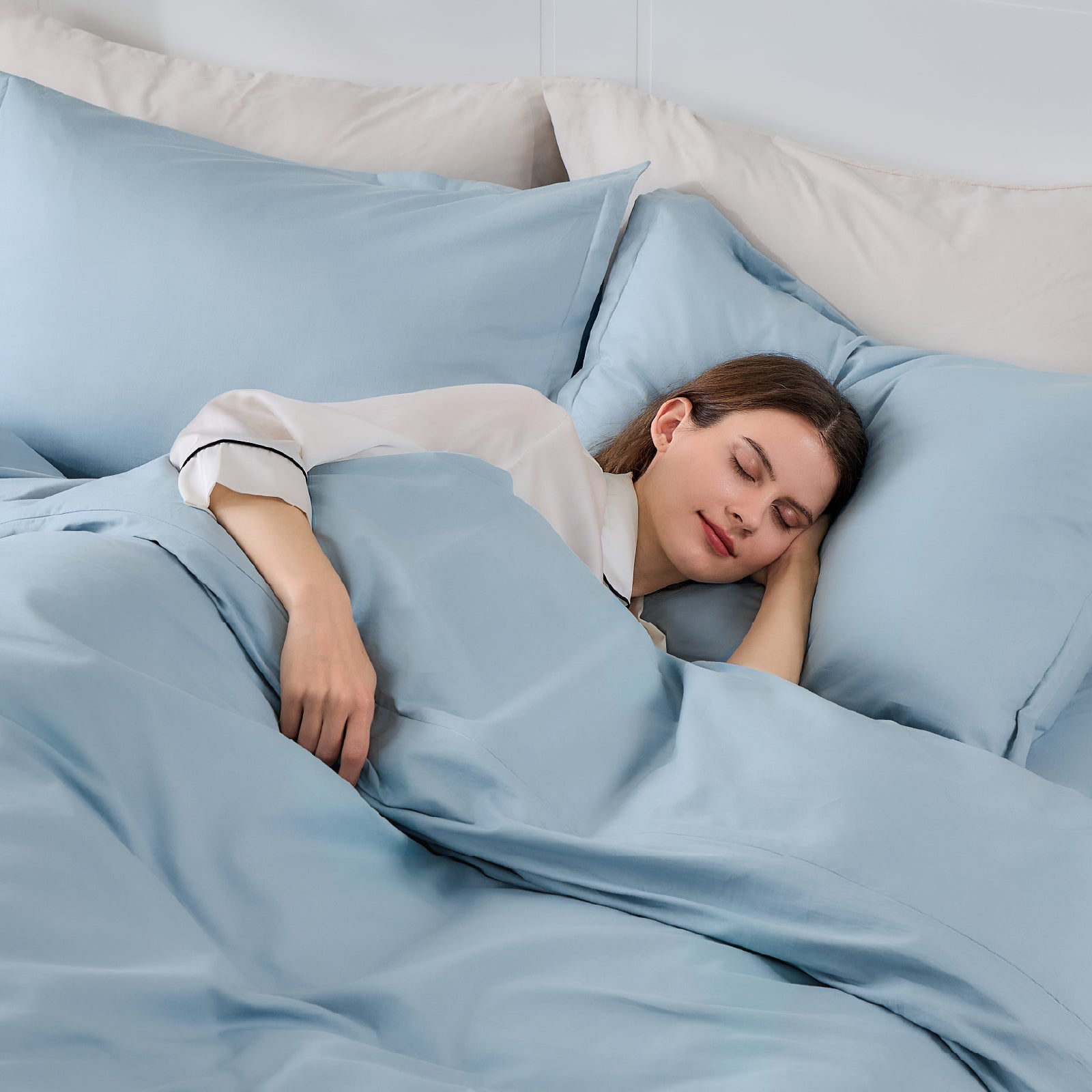 Litanika 100% cotton percale duvet cover set in crisp white with a smooth, breathable bedding design.