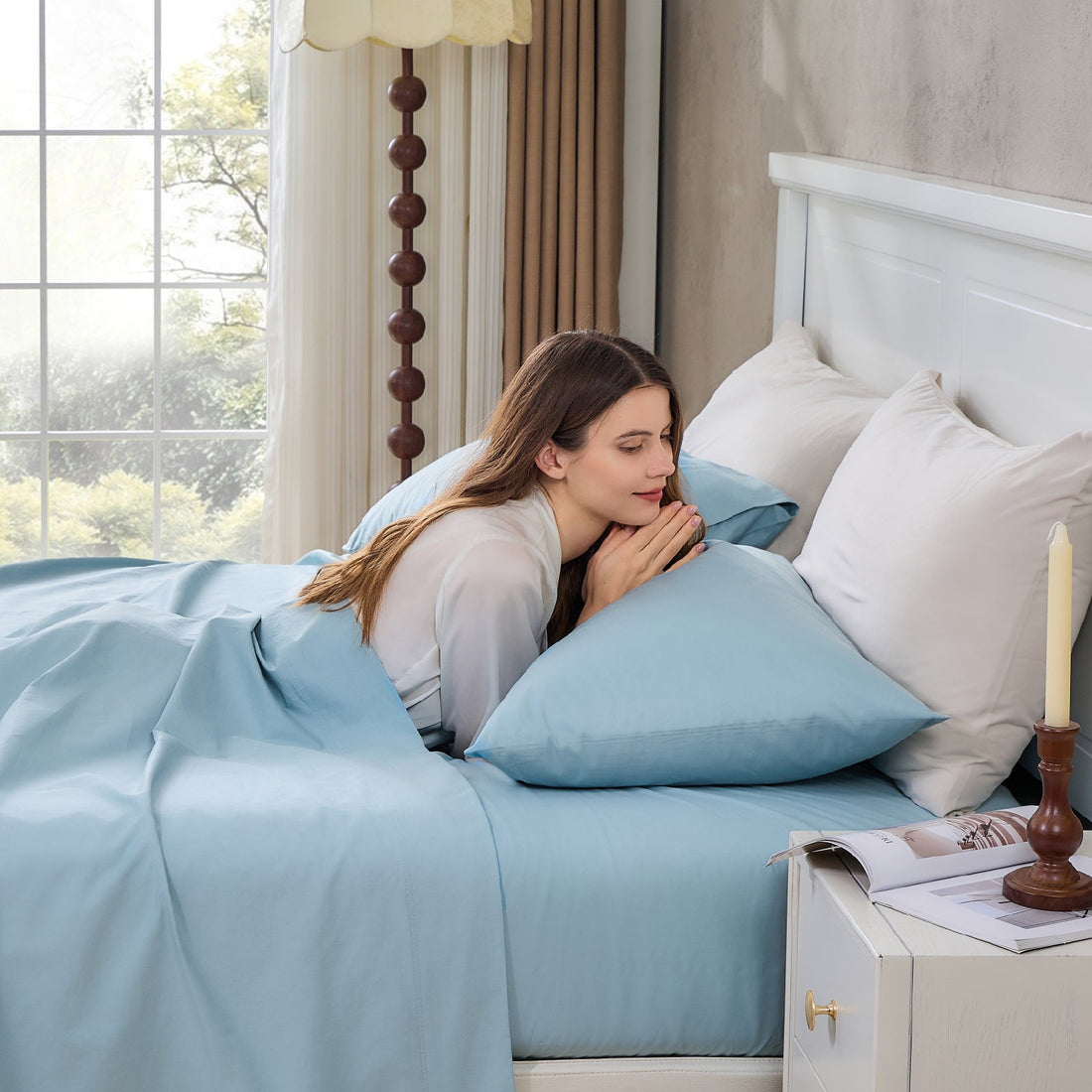 Litanika 100% cotton percale bedding sheet set with smooth, crisp white sheets and matching pillowcases on a bed.