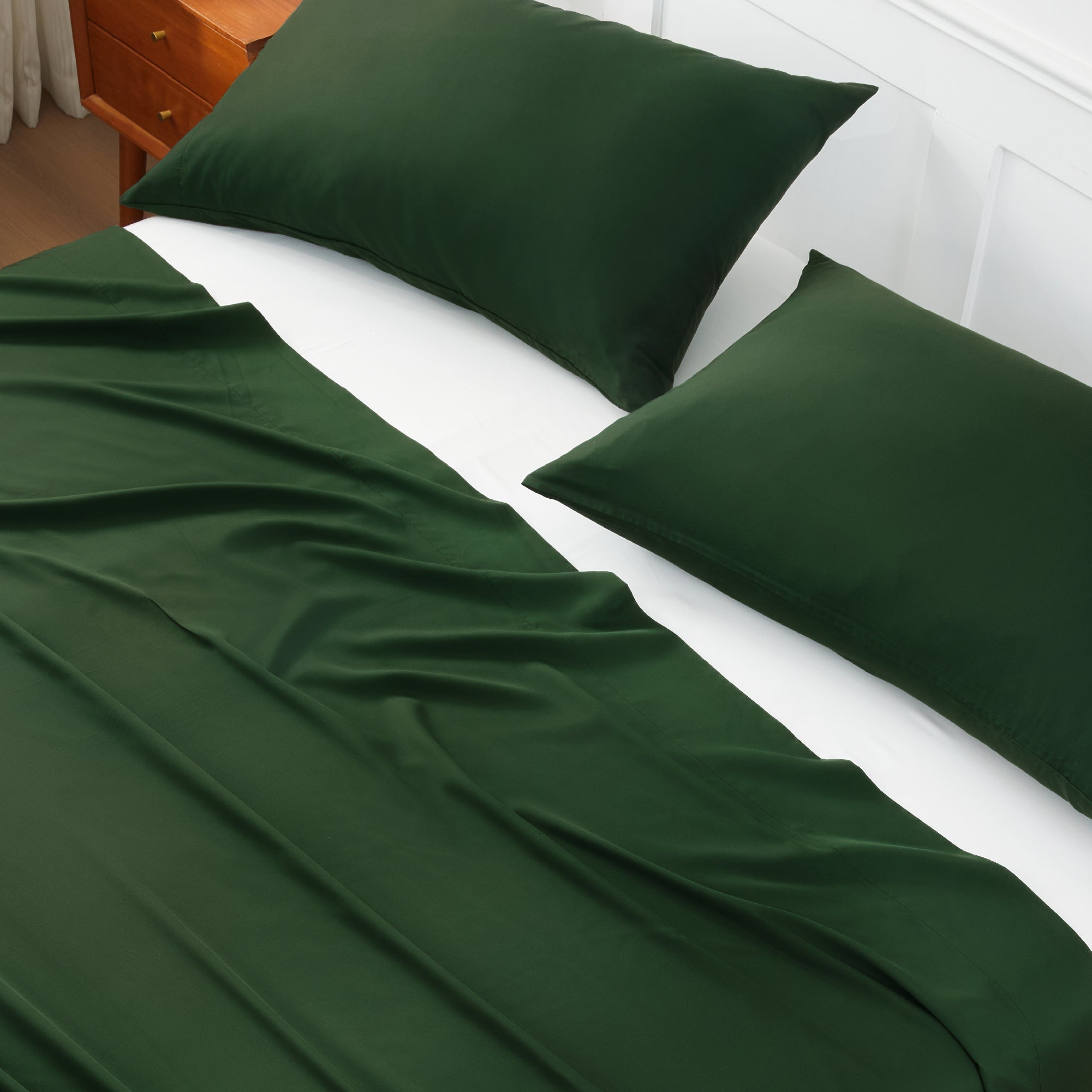 Litanika bamboo viscose soft bedding sheet set with smooth, silky fabric and crisp, clean white sheets on a neatly made bed.