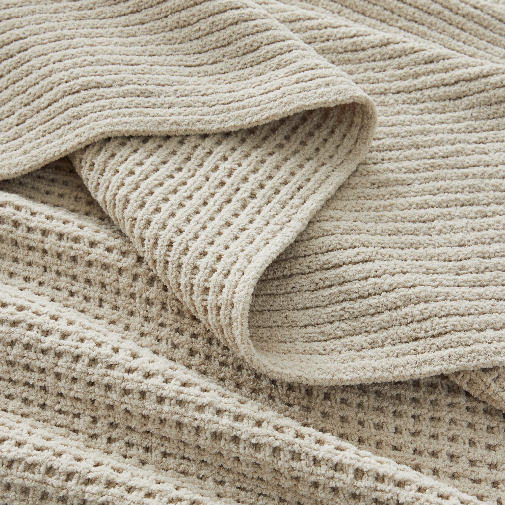 Soft chenille knit waffle throw blanket by Litanika, showing textured fabric and cozy design suitable for bedding.