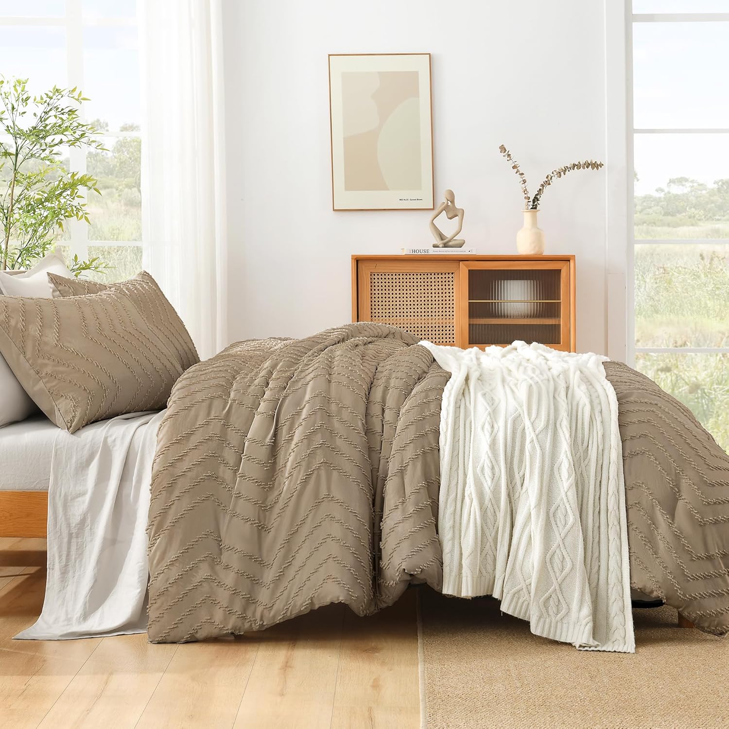 Litanika cozy bedding 3-piece chevron comforter set with matching pillow shams and sheets, in soft, neutral tones.