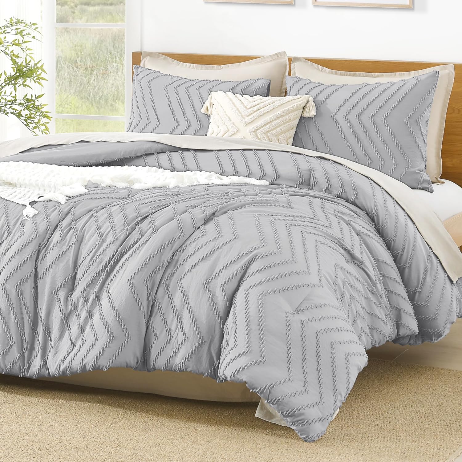 Litanika Cozy Bedding 3-Piece Chevron Comforter Set with matching pillow shams on a bed with white sheets.