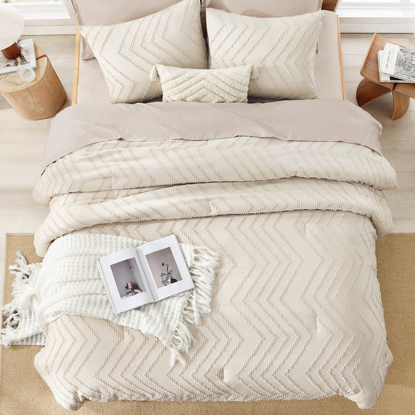 Litanika cozy bedding 3-piece chevron comforter set with matching pillow shams and bedsheets on a neatly made bed.