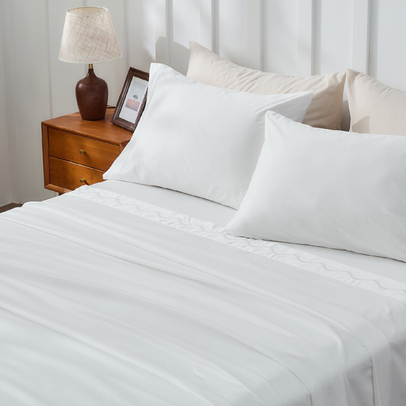 Litanika crisp percale organic cotton pillowcases from bedding sheet set, showcasing smooth, white, breathable fabric for comfortable sleep.