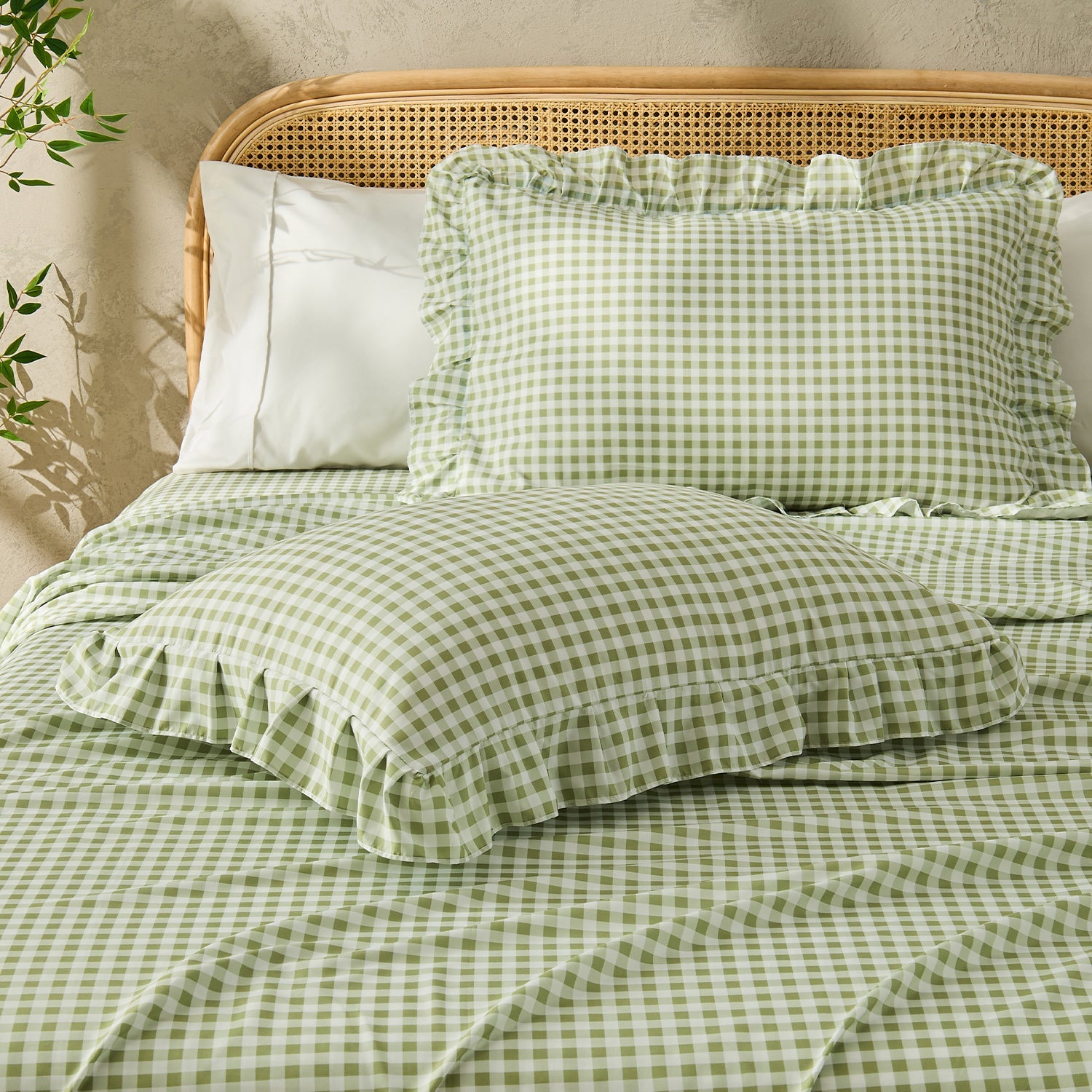 Litanika farmhouse gingham ruffle 4-piece bedding sheet set with classic check pattern and ruffled edges for cozy bedroom decor.