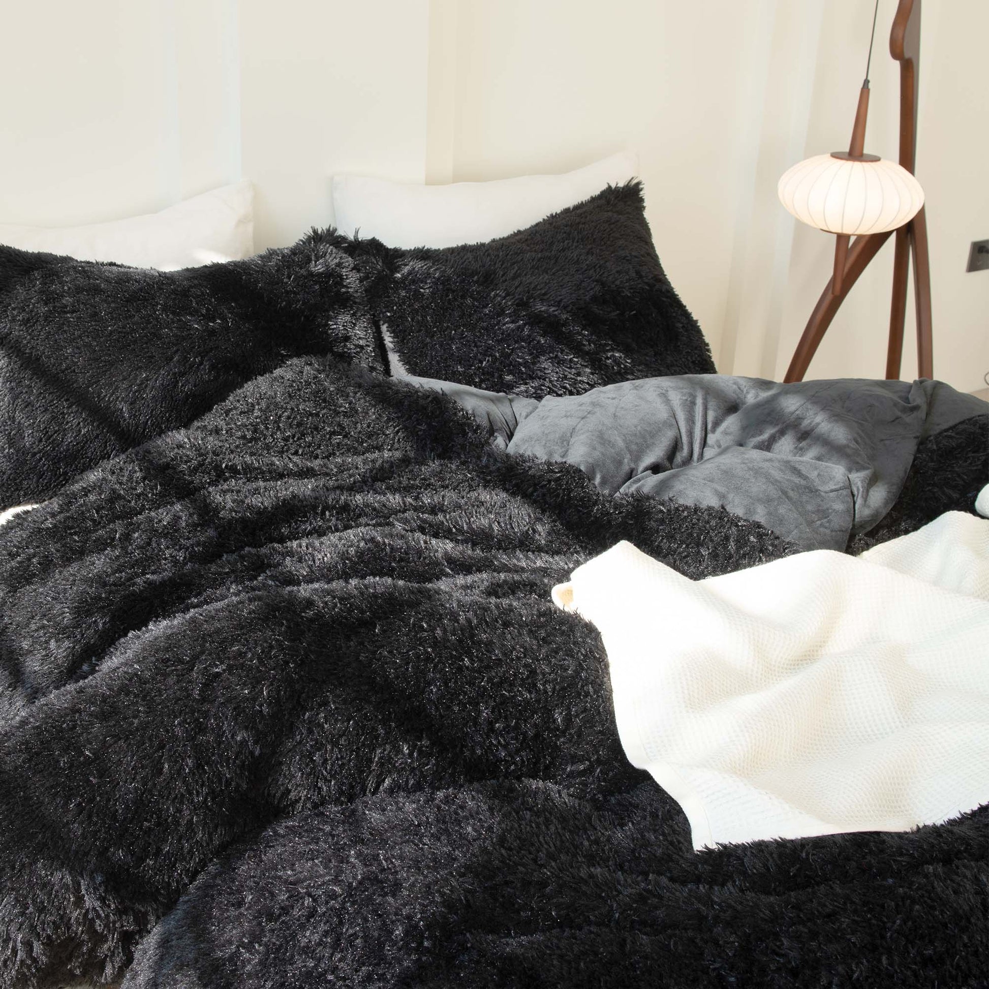 Litanika fluffy luxury shaggy plush comforter set with warm velvet texture, featuring three pieces in a cozy bedroom setting.