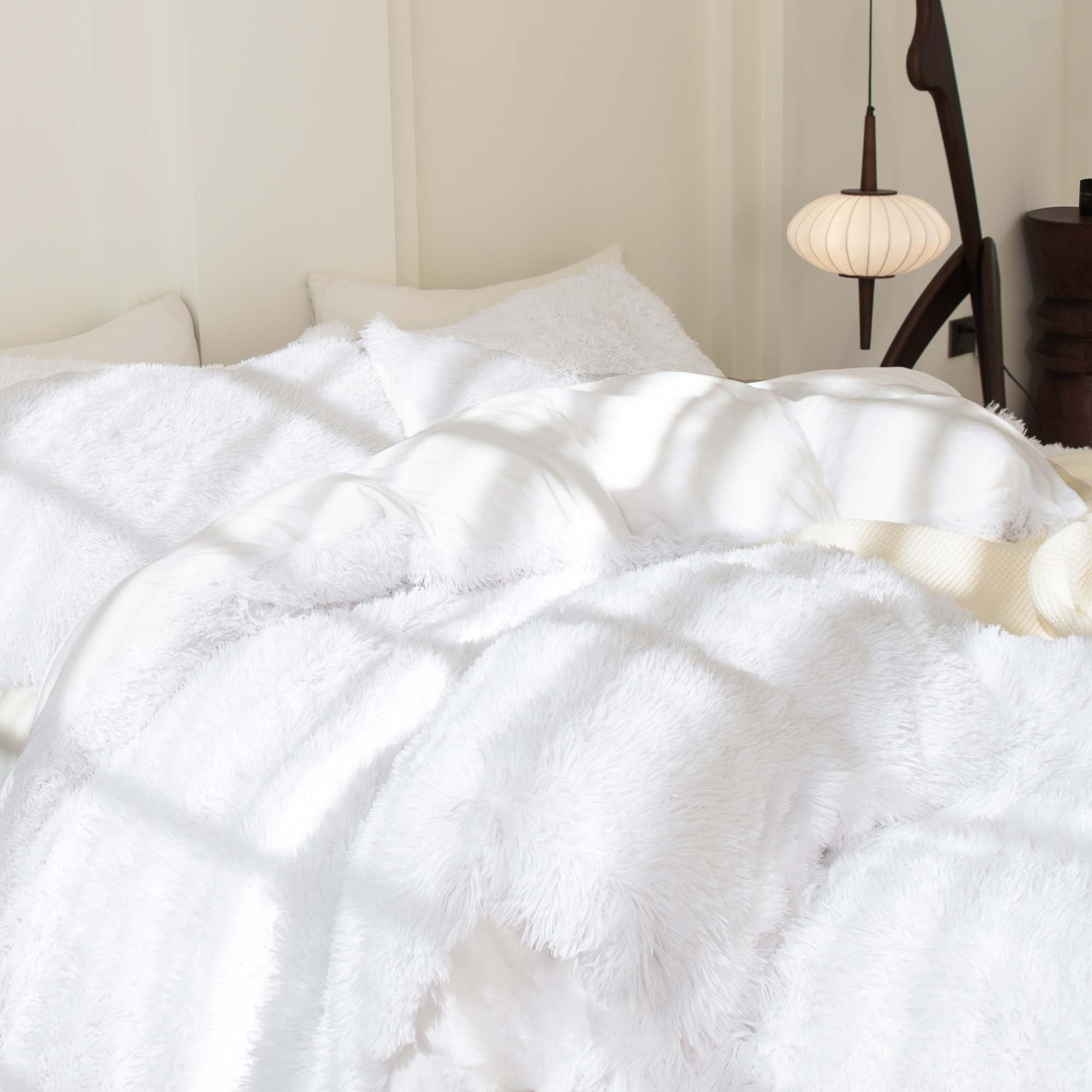 Litanika fluffy luxury shaggy plush comforter set featuring soft velvet texture and three coordinating pieces in a cozy arrangement.