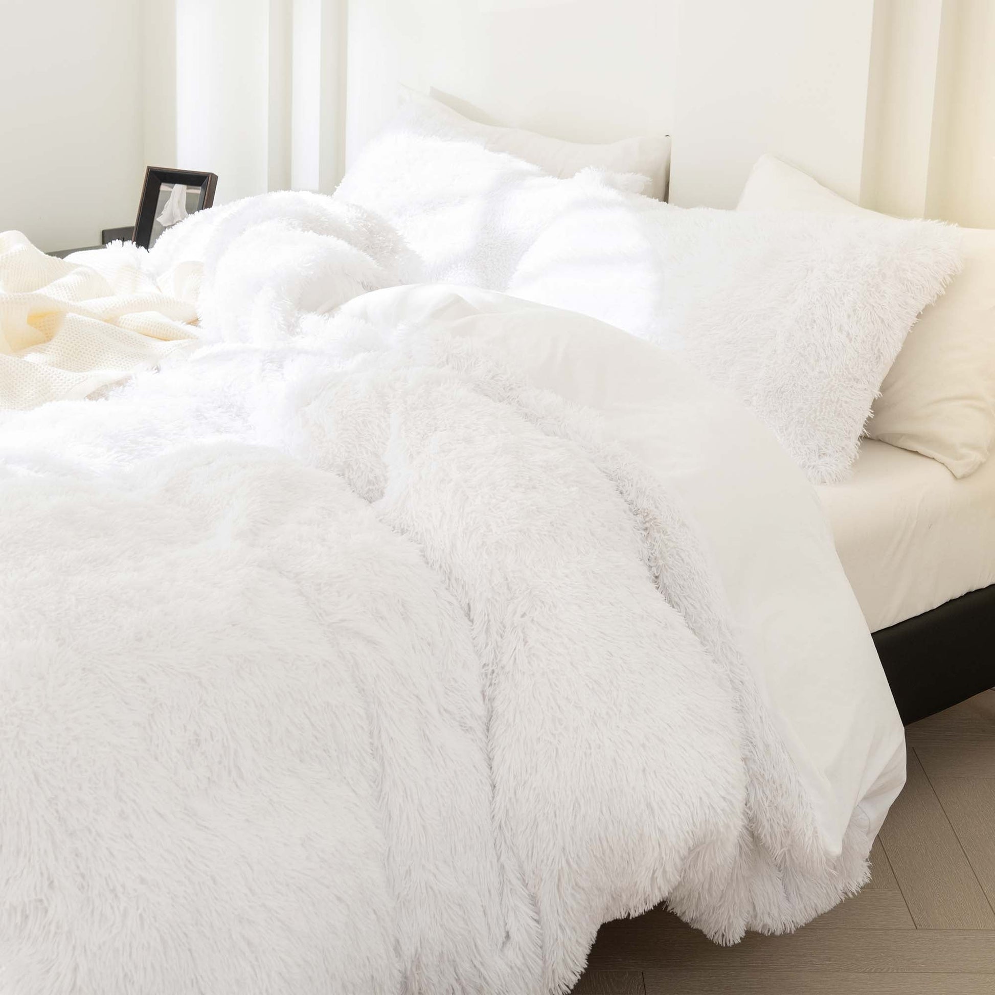 Litanika fluffy luxury shaggy plush comforter set with three pieces in soft velvet texture, showcasing warm bedding style.