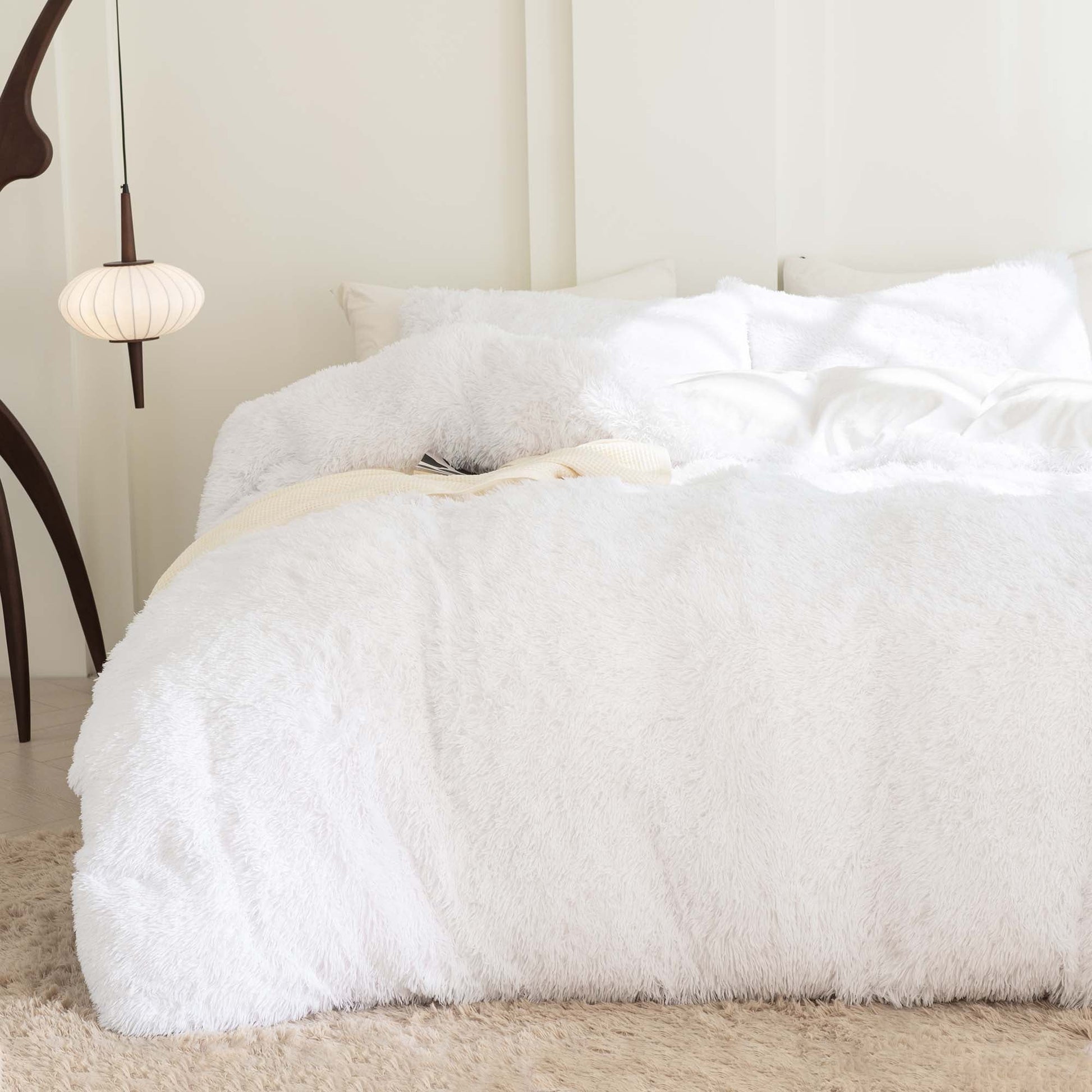Litanika fluffy shaggy plush comforter set in soft velvet, featuring three pieces for cozy bedding warmth.