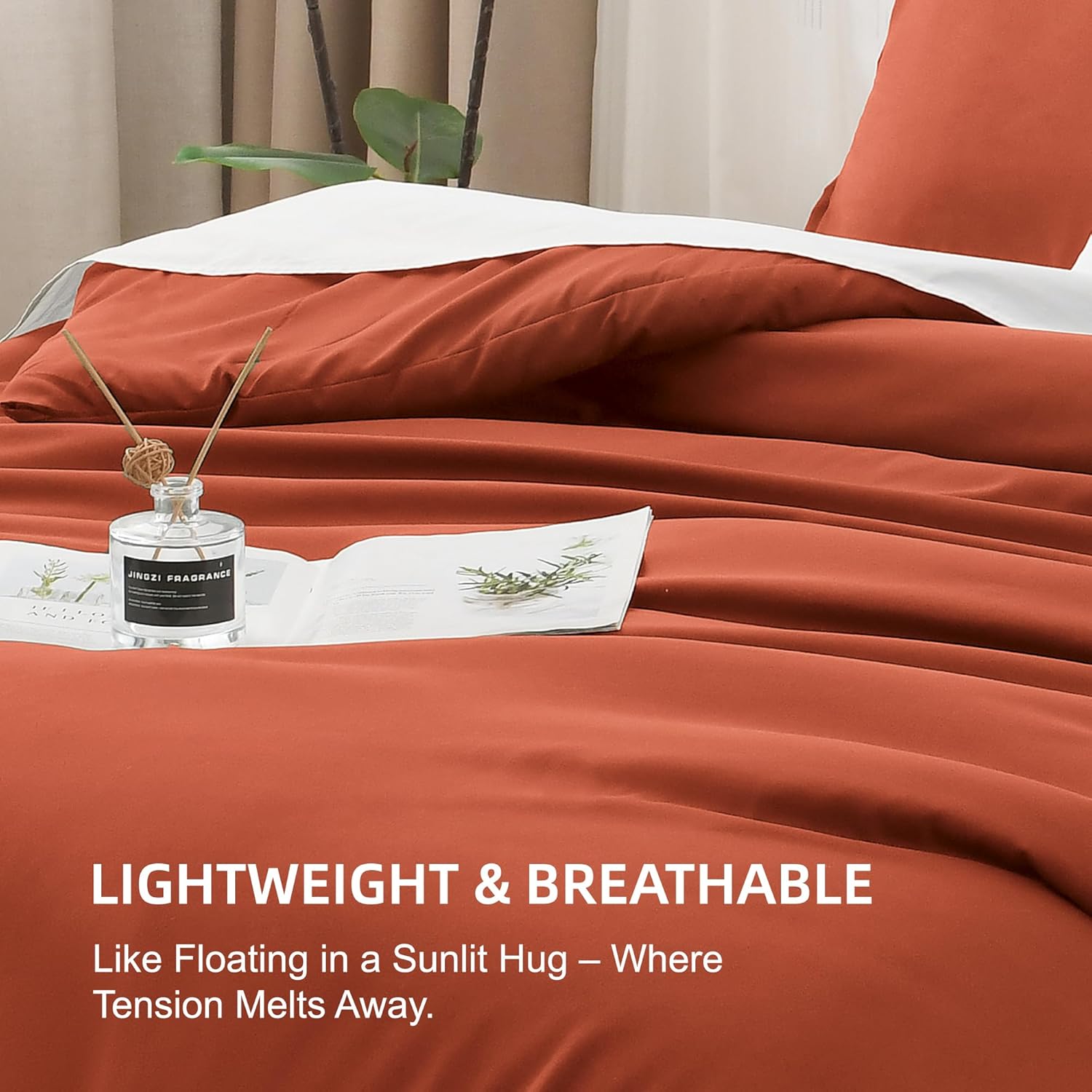 Litanika lightweight solid down alternative 3-piece comforter bedding set with duvet and pillow shams on a bed.