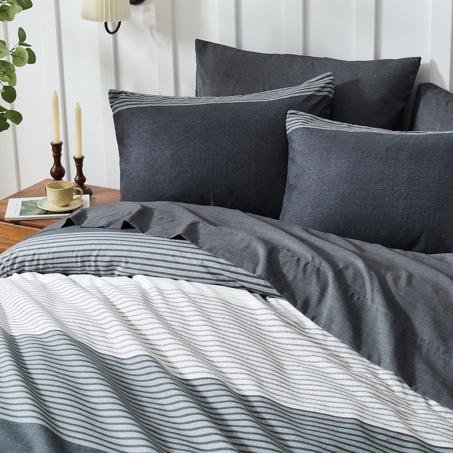 Litanika modern striped 3-piece duvet cover bedding set with blue and white patterns on a neatly made bed.