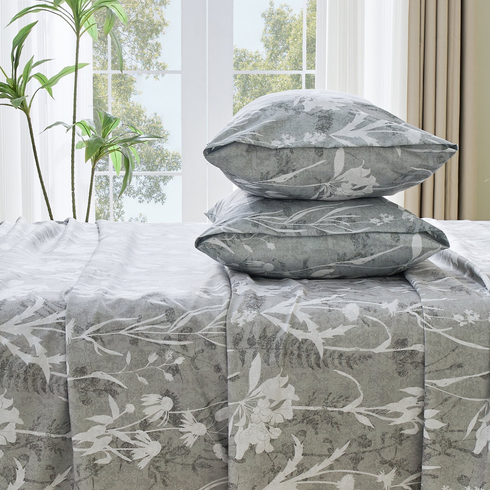 Reversible botanical flowers bedding sheet set by Litanika with floral and leaf patterns on soft fabric.