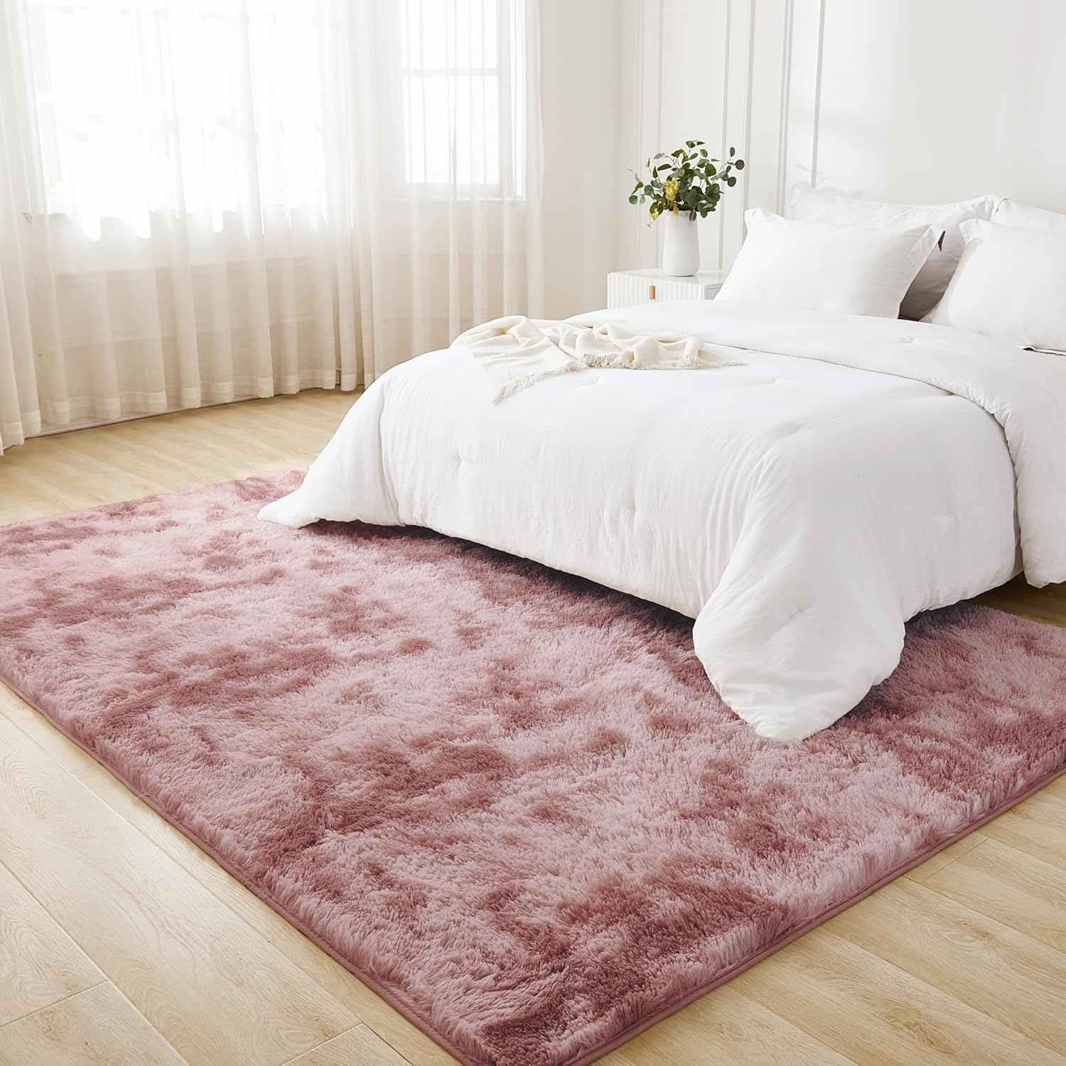 Litanika tie-dyed shag area rug with high pile, ideal for living rooms, bedrooms, playrooms, and dorms, featuring vibrant colors.