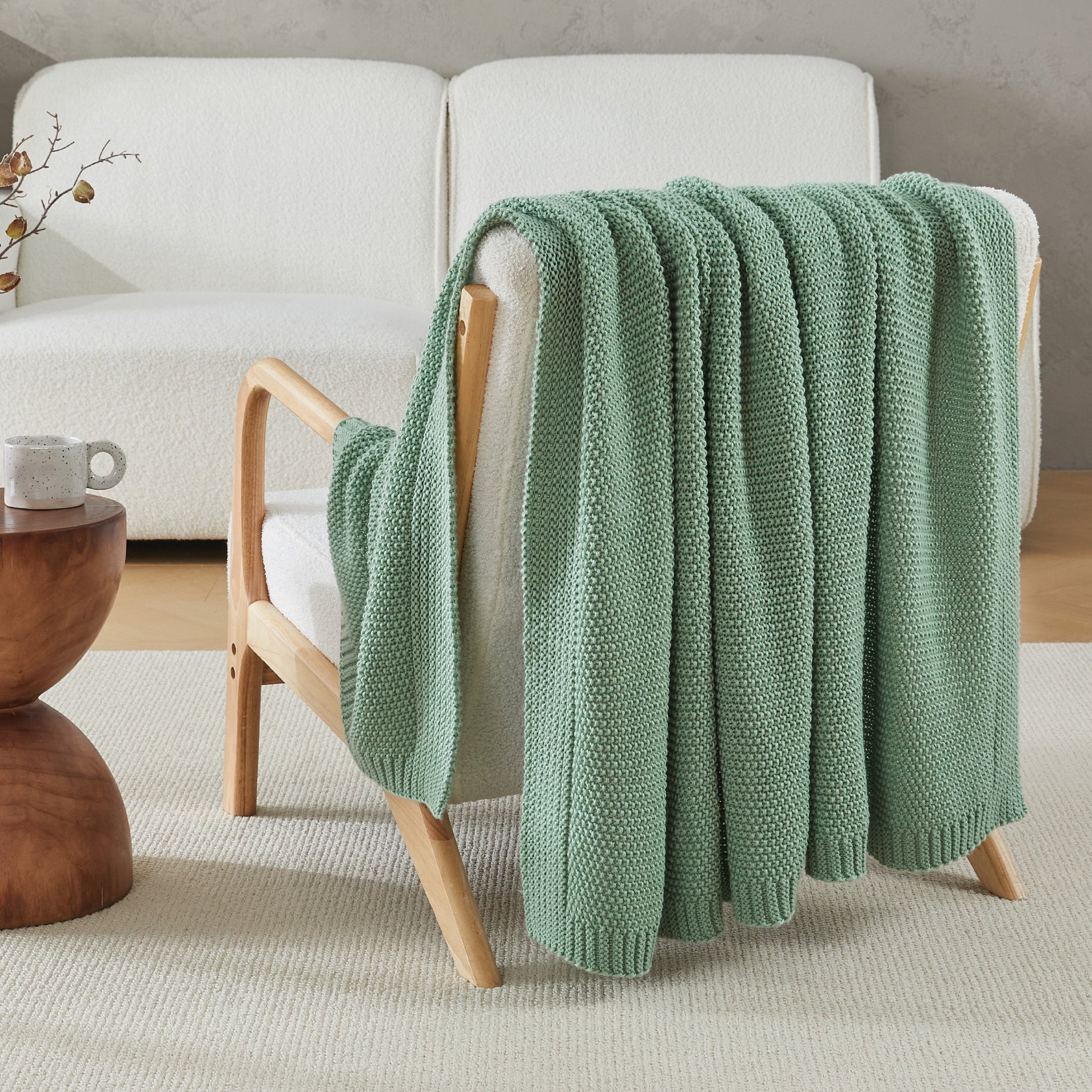 Litanika soft cozy cable knit throw blanket in neutral color, perfect for bedding and adding warmth to your bed or sofa.