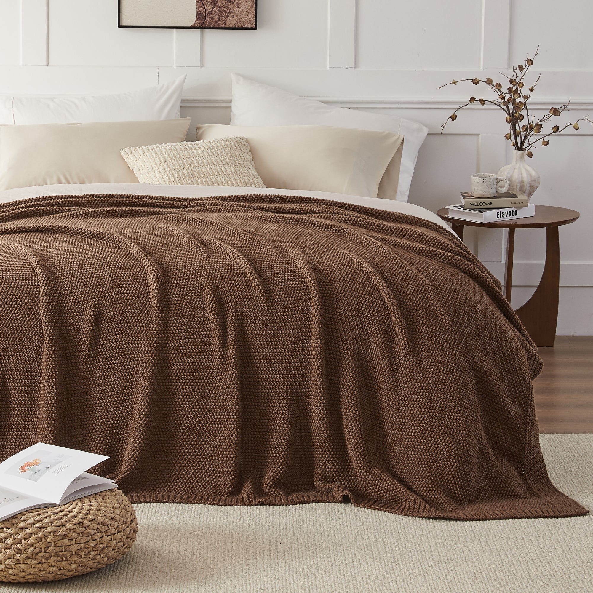 Litanika soft cozy cable knit throw blanket in a neutral color, perfect for bedding and adding warmth and texture to a bedroom.