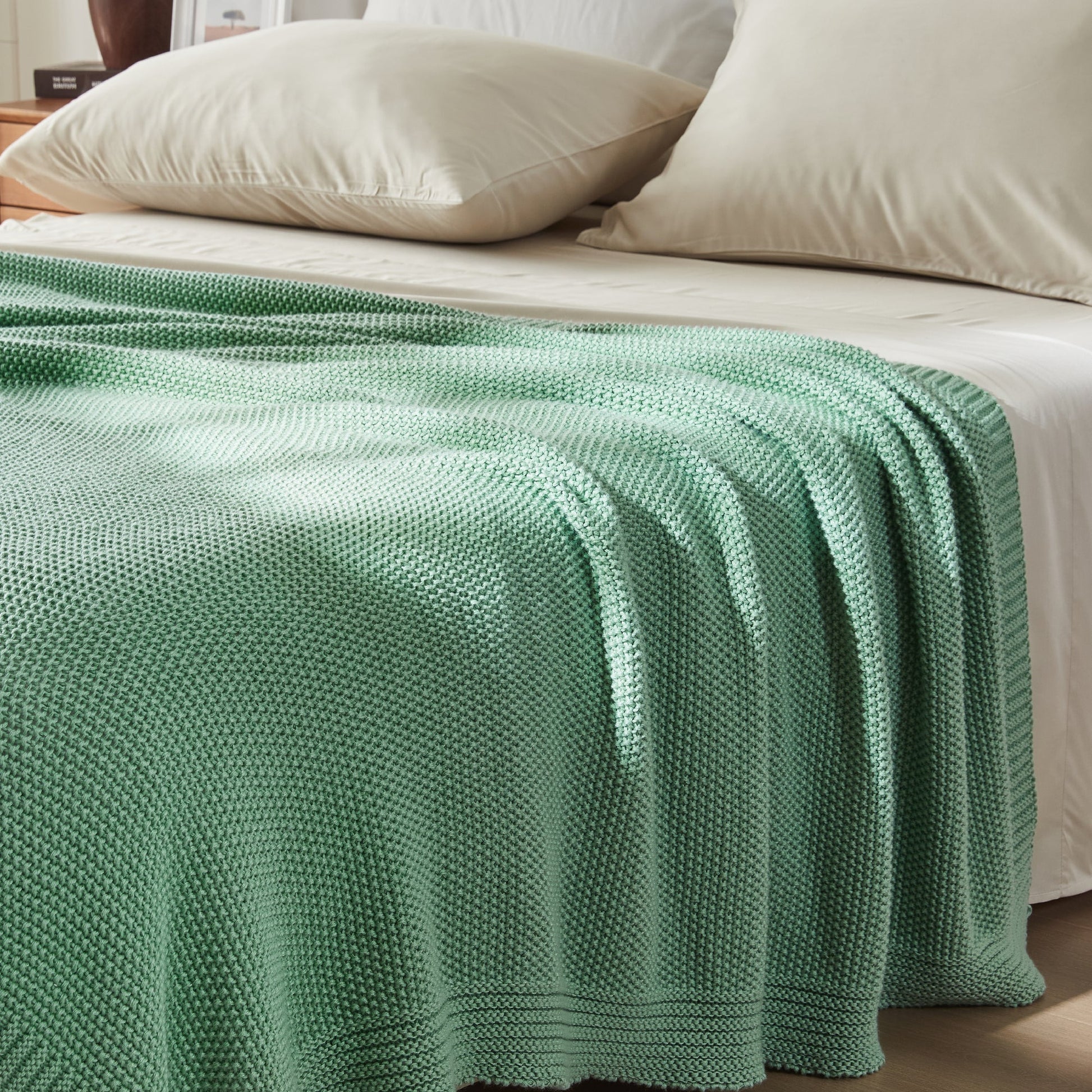 Litanika soft cozy cable knit throw blanket in neutral color, perfect for bedding or lounging.