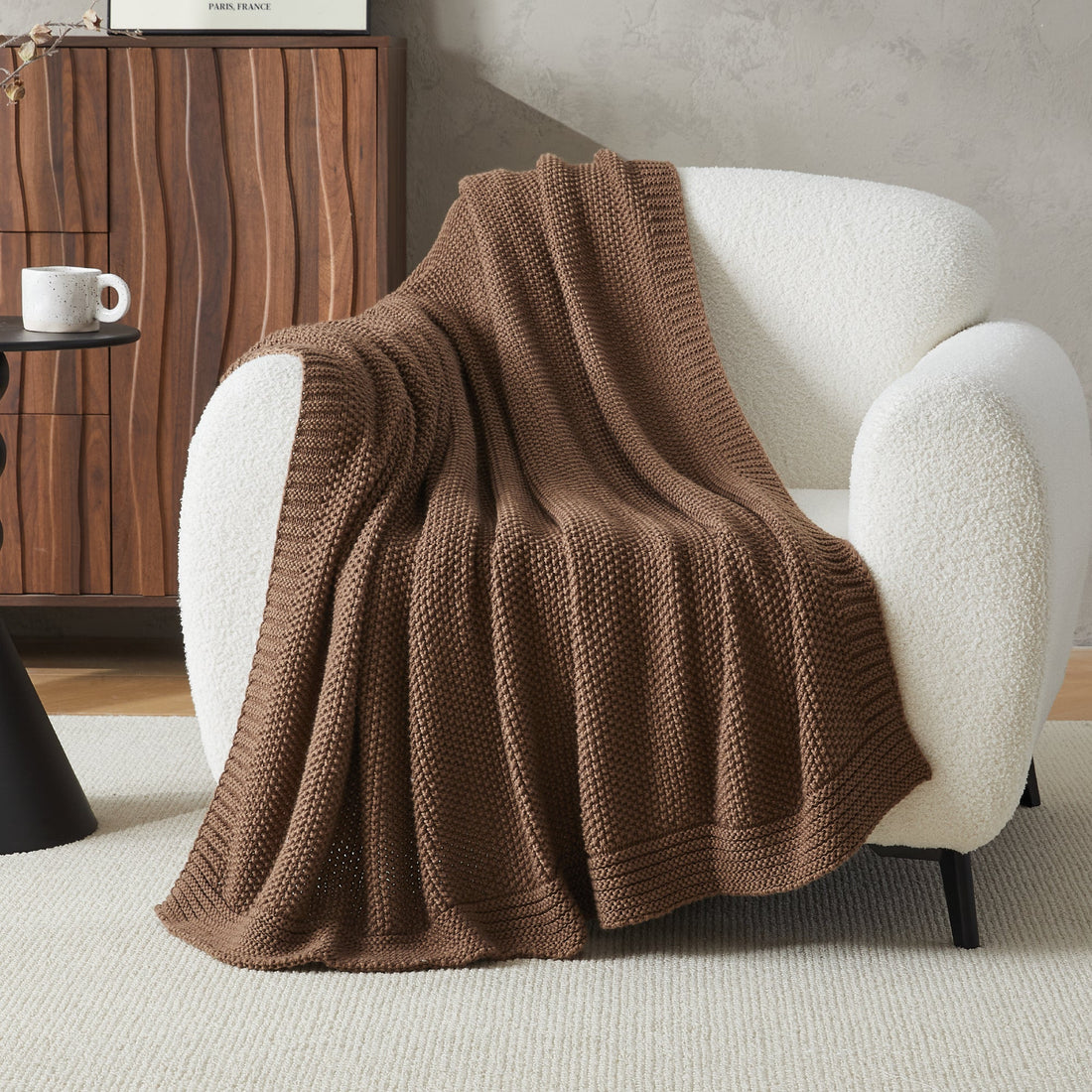 Litanika soft cozy cable knit throw blanket in neutral color, perfect for bedding or cozying up on a sofa