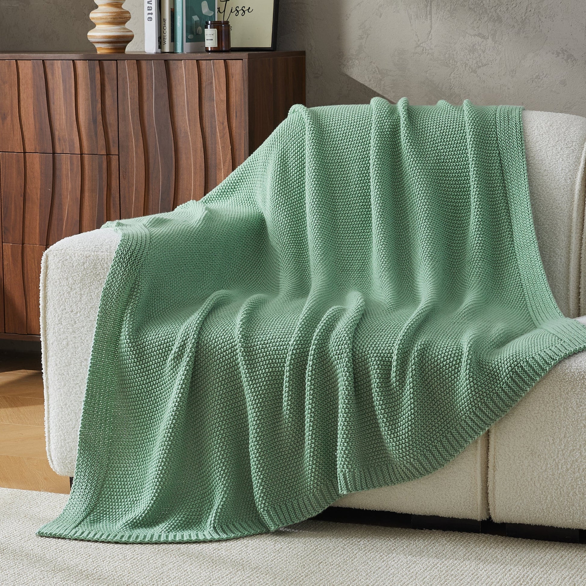 Litanika soft cozy cable knit throw blanket in neutral color, perfect for bedding and adding warmth to your bed or sofa.