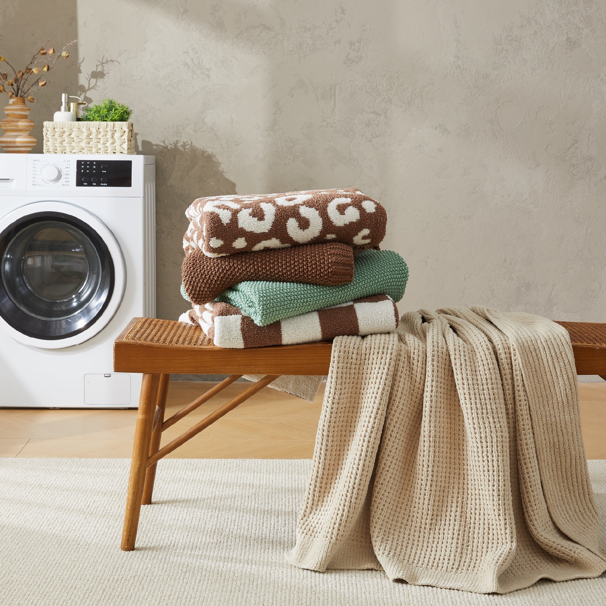 Litanika soft cozy cable knit throw blanket in a warm, textured design, perfect for adding comfort to bedding or sofa.