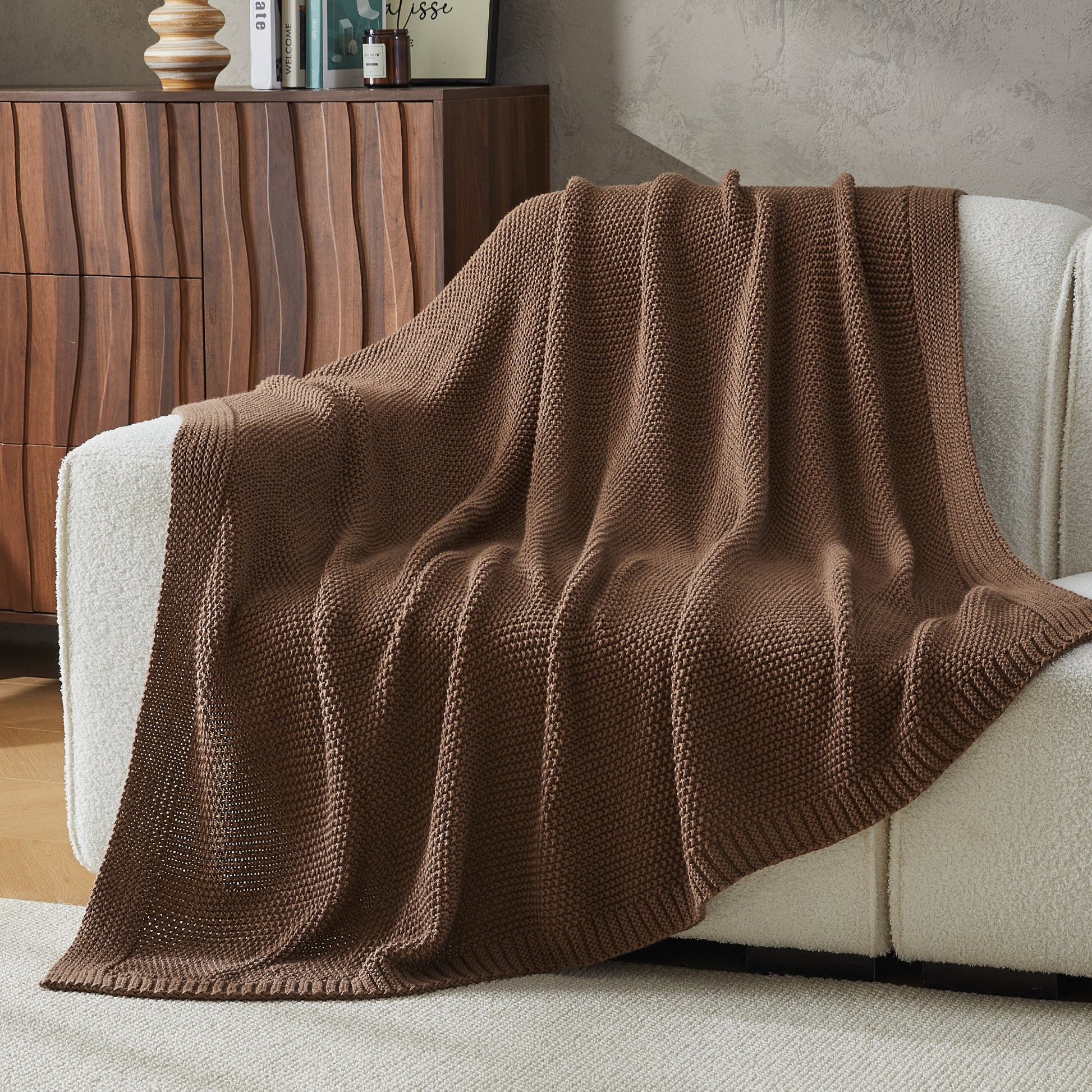 Soft cozy cable knit throw blanket from Litanika, featuring textured knit pattern and plush fabric for warm bedding comfort.