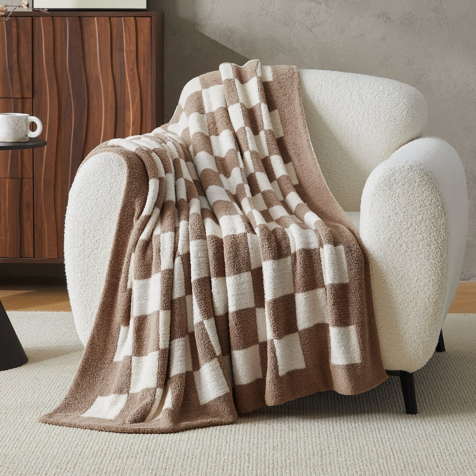 Litanika soft knit checkered throw blanket, cozy bedding accessory with a plaid pattern in neutral tones, perfect for warmth and decor.