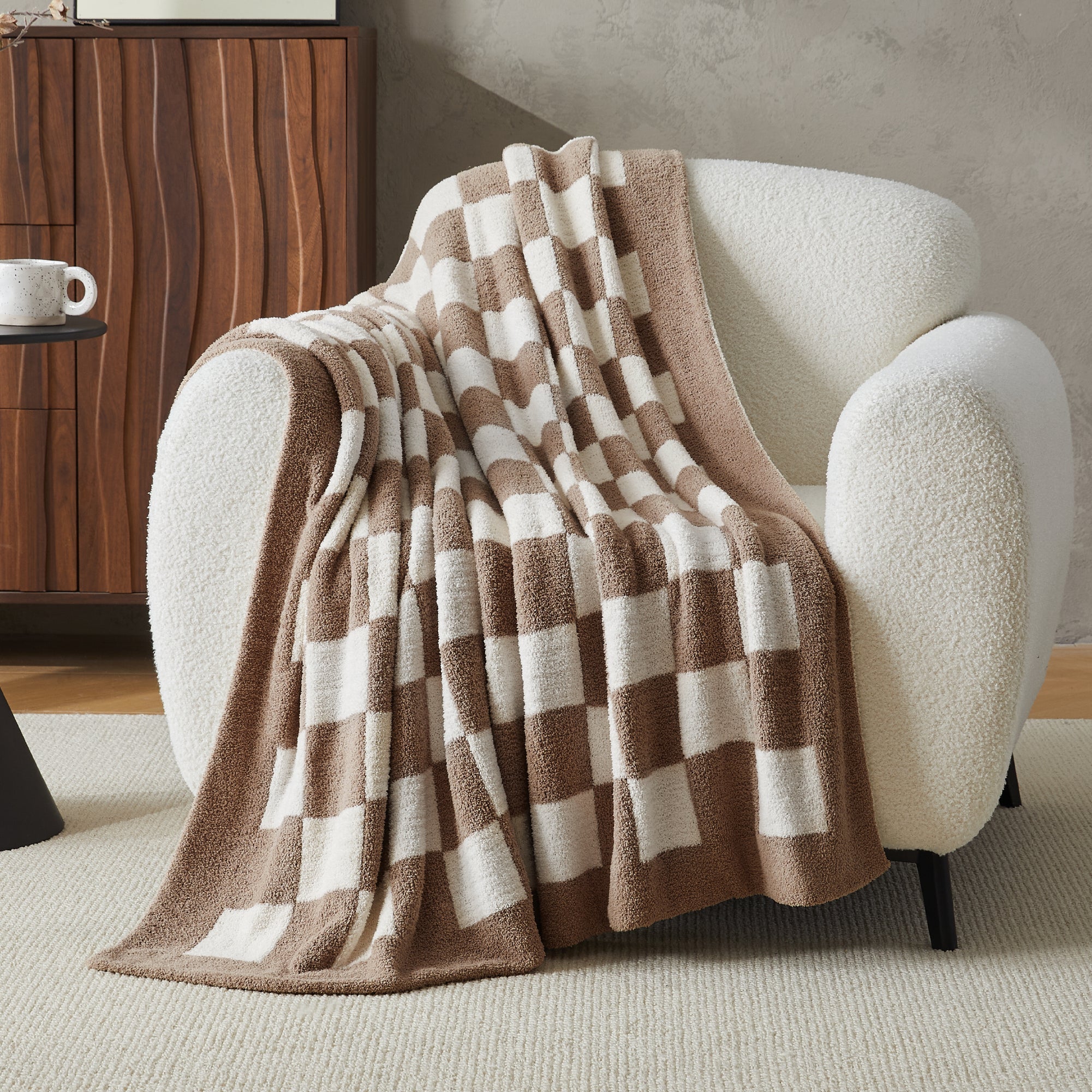 Litanika soft knit checkered throw blanket, cozy bedding accessory with a plaid pattern in neutral tones, perfect for warmth and decor.