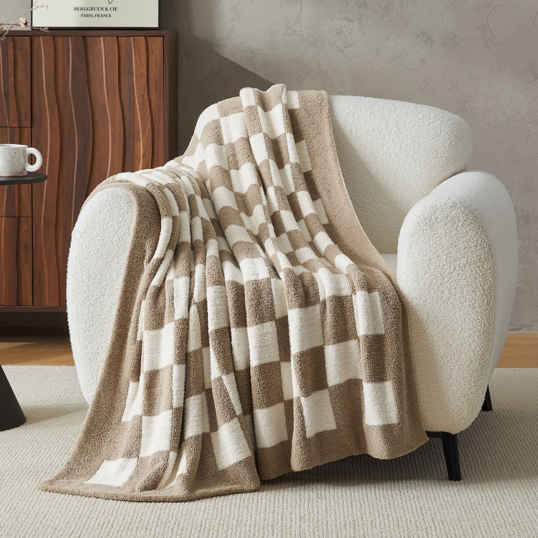 Litanika soft knit checkered throw blanket spread on a bed, showcasing cozy, lightweight bedding with a classic checkered pattern.
