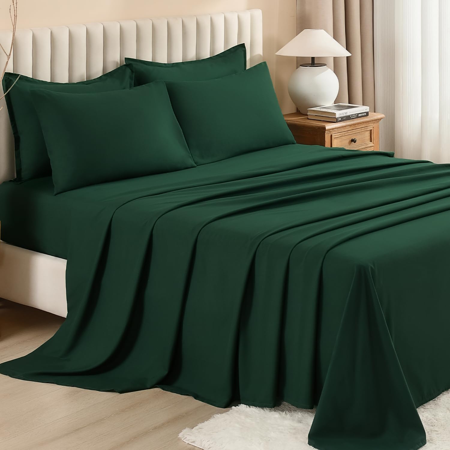 Litanika solid down 7-piece comforter bedding set with matching pillow shams and sheets, soft and cozy for bedroom decor.