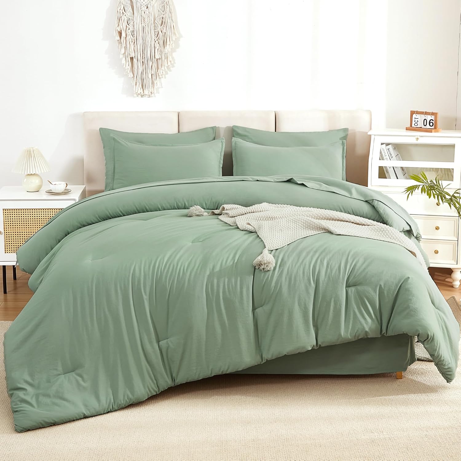 Litanika solid down sage green twin size bedding comforter set with 7 pieces, including comforter, pillow shams, and sheets.