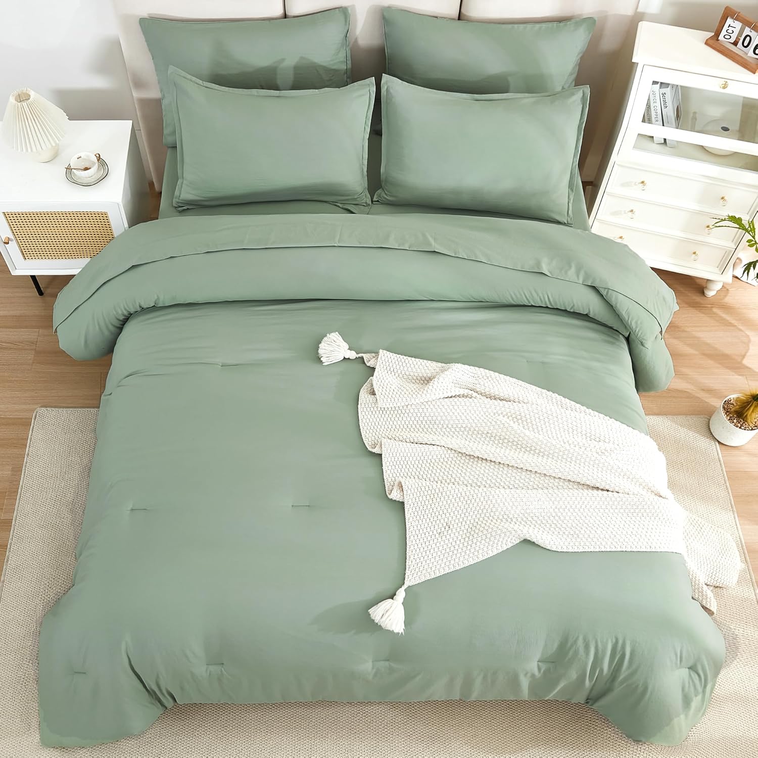Sage green twin size solid down bedding comforter set with 7 pieces from Litanika, including comforter, sheets, and pillows.